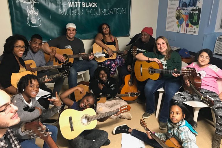 Group Learning Guitar with the Foundation